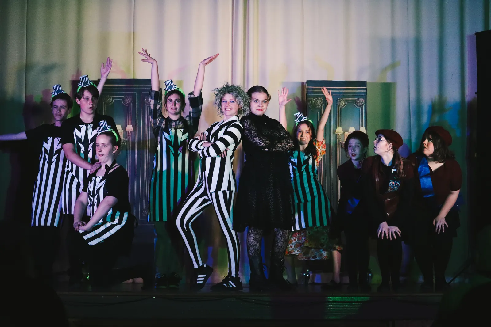 CBY Academy students performing together on stage